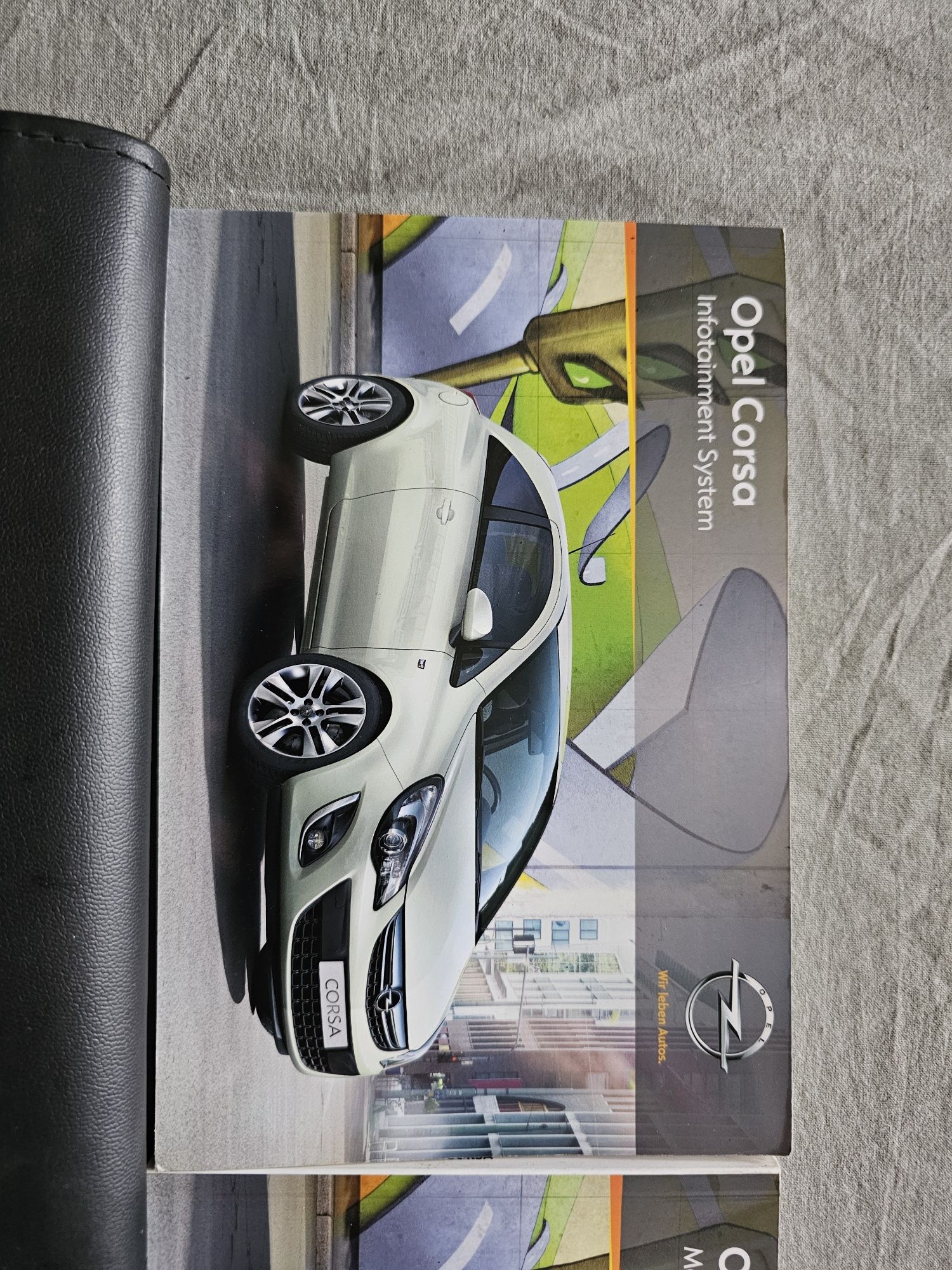 Instrukcja obsługi + etui + książka serwisowa Opel Corsa D w języku fr
