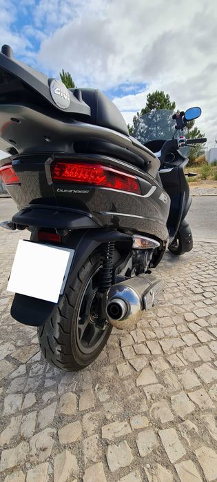 mp3 500. apenas 23817kms com revisao. de garagem estimada. CARTA B