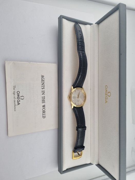 Золотые часы Omega