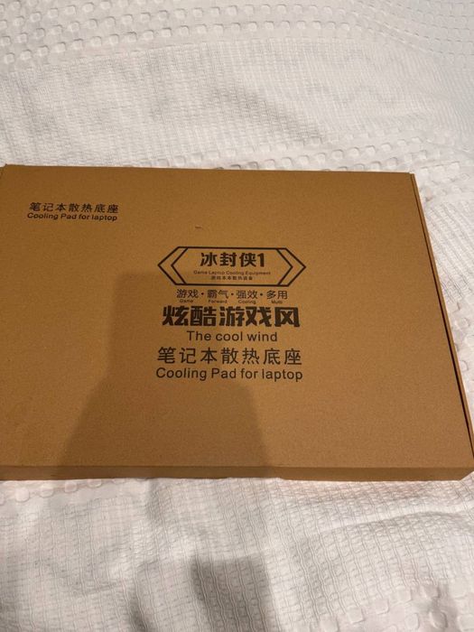 Підставка для ноутбука з охолодженям