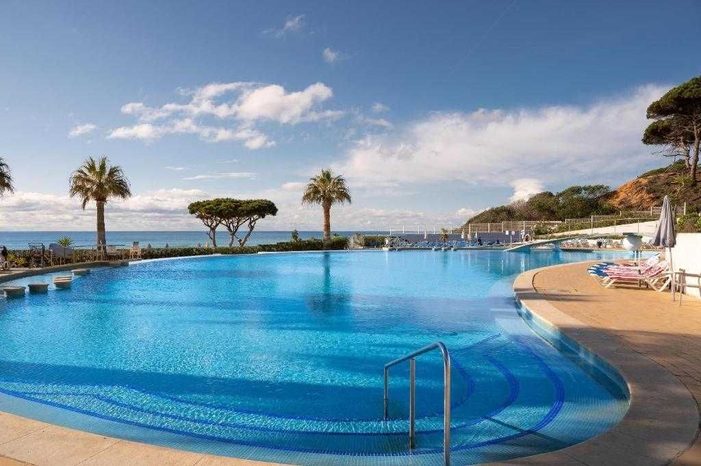 5* Oura View Beach Club - Vista Mar -  (22/07 a 28/07) - T1 (4pax+1)