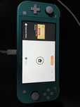 Nintendo Switch Lite Green + pokrowiec