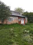 Житловий будинок та земельна ділянка 25 сот