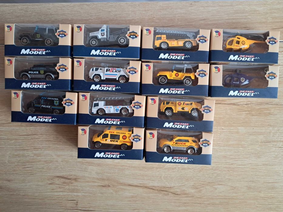 Seria 13 szt. metalowych pojazdów w oryginalnych opakowaniach