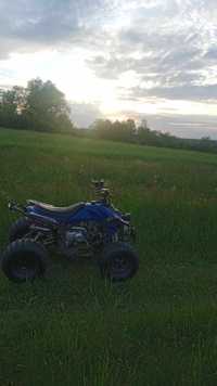 Niebieski quad 125