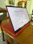 Samsung / Chromebook czerwony z przekręcanym, dotykowym ekranem