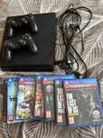 PlayStation 4 500 GB + 2 pady + 7 gier