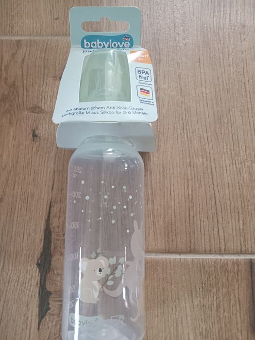 Соска пустушка baby love та пляшечки