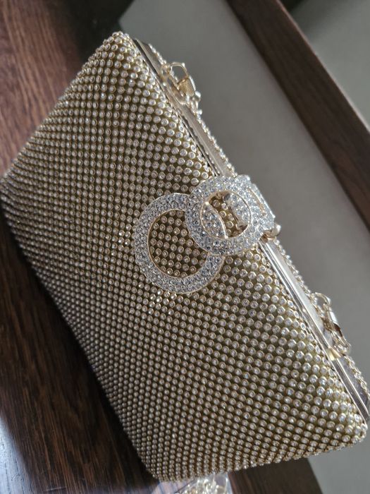 Elegancka torebka zlota