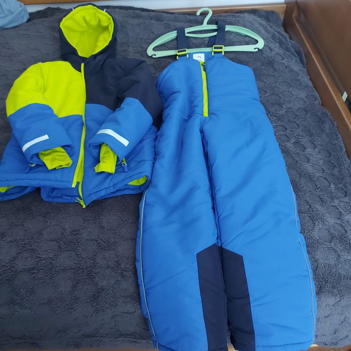 Зимові комбінезони
