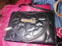 Mala Moschino como nova
