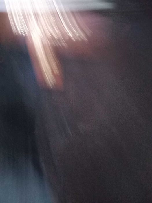 Пуховик зимовий чорний оздоблений  натуральним хутром