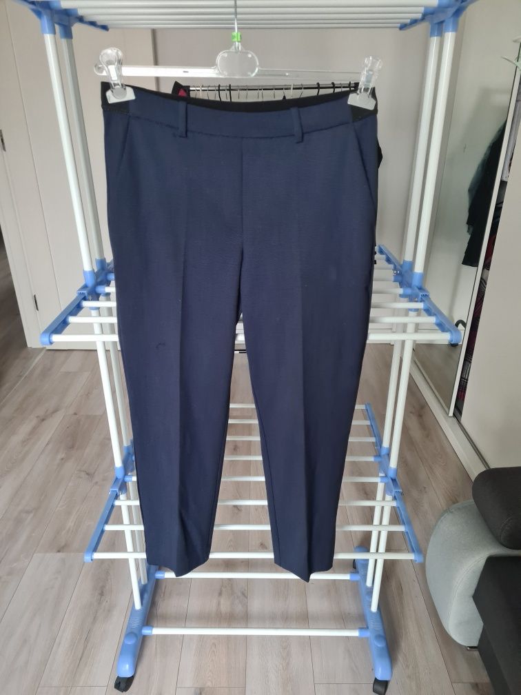 Eleganckie spodnie marki H&M. Rozmiar 38.
