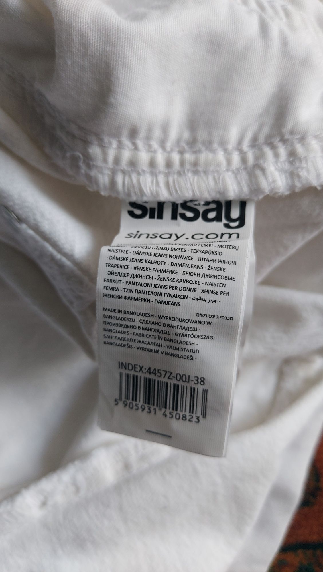 Białe jeansy damskie Sinsay roz 38