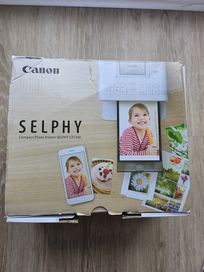 Drukarką canon selphy CP 1300 + zapas papieru na zdjecia gratis.