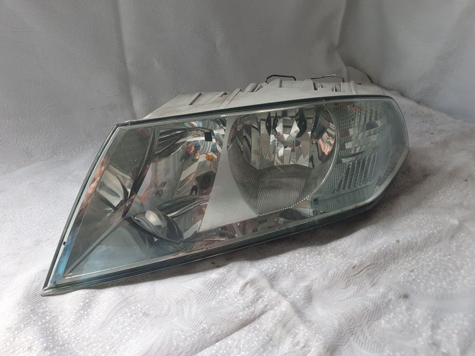 Lampa lewa Skoda Octavia II Europa reflektor przedni