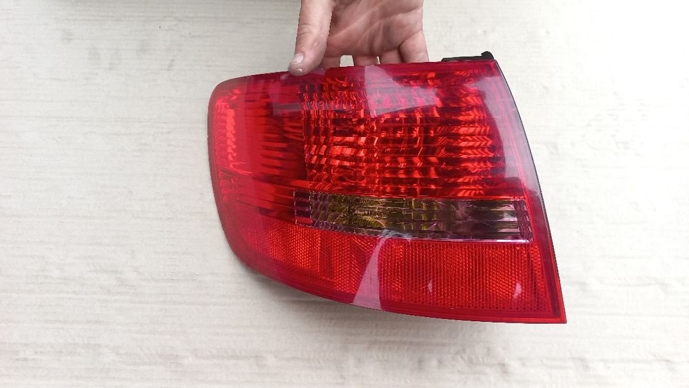 Audi a6 c6 kombi avant lampa lewa lewy tyl tylna  zwykle zarowki