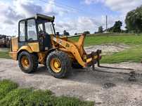 Ładowarka miniładowarka przegubowa JCB 406