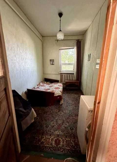 Продам кирпичный Дом на поселке  Строителей в городе Каменское.