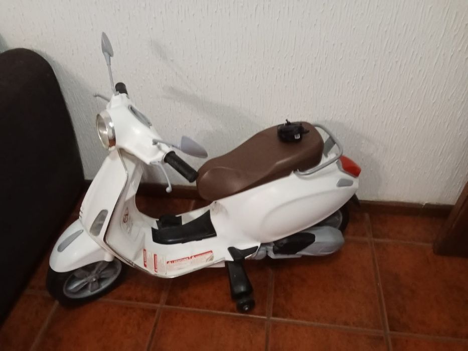 Moto a materia criança