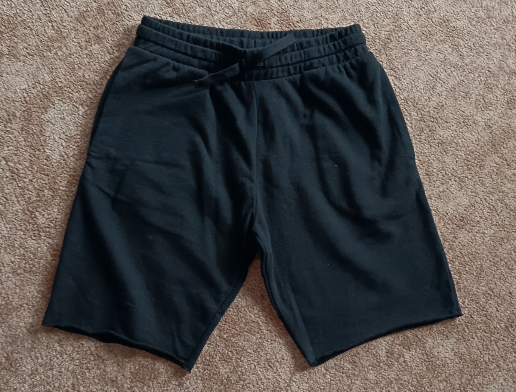Bawełniane czarne spodenki chłopięce h&m rozm 170 cm