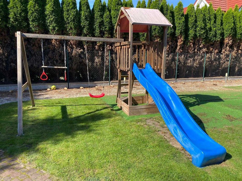 Plac zabaw drewniany do ogrodu huśtawka zjeżdżalnia domek OBI