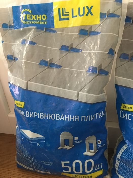 Система для вирівнювання плитки та профіль CD60 i UD28