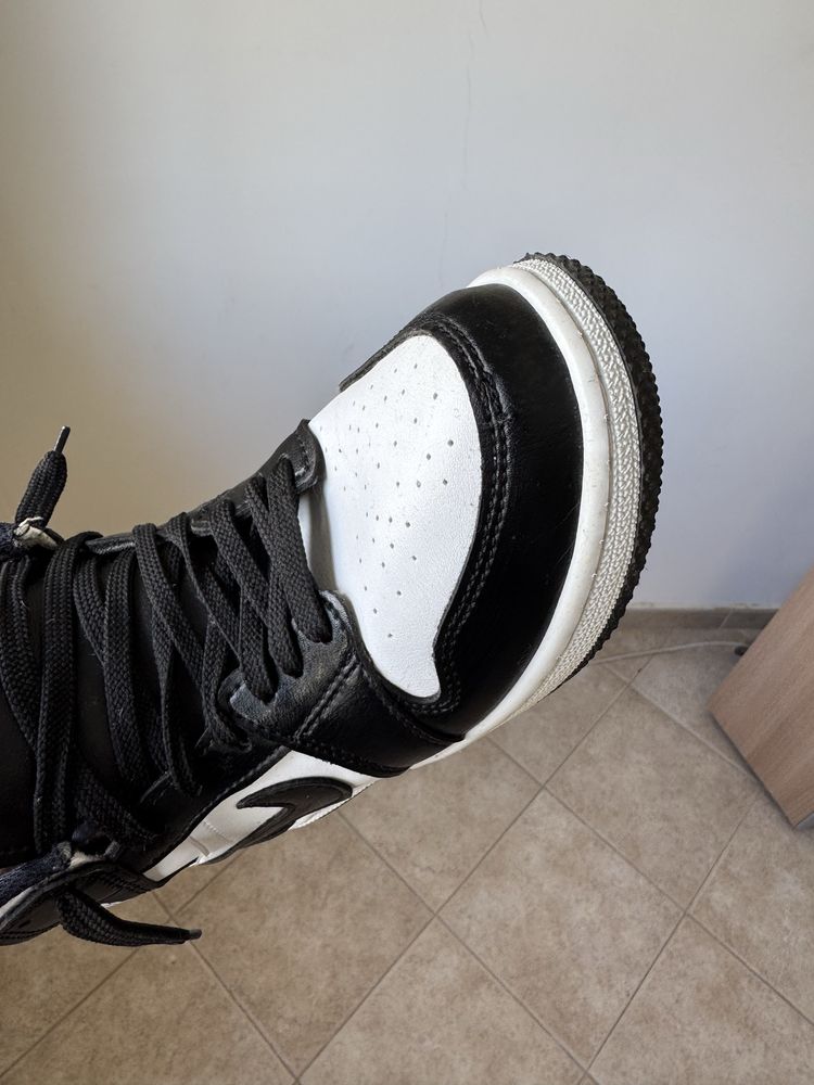 Tenis bota ,pouco uso tamanho 40