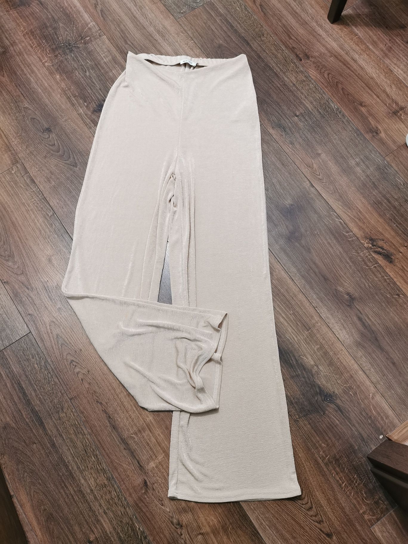 Szerokie spodnie eleganckie dresowe dzwony L 40