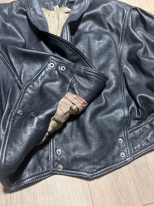 Вінтажна шкіряна куртка