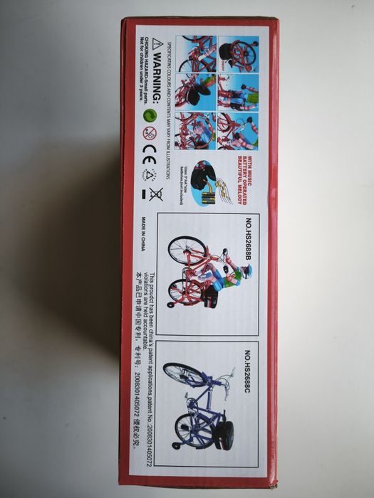 Brinquedo bicicleta. Luzes, música e movimento