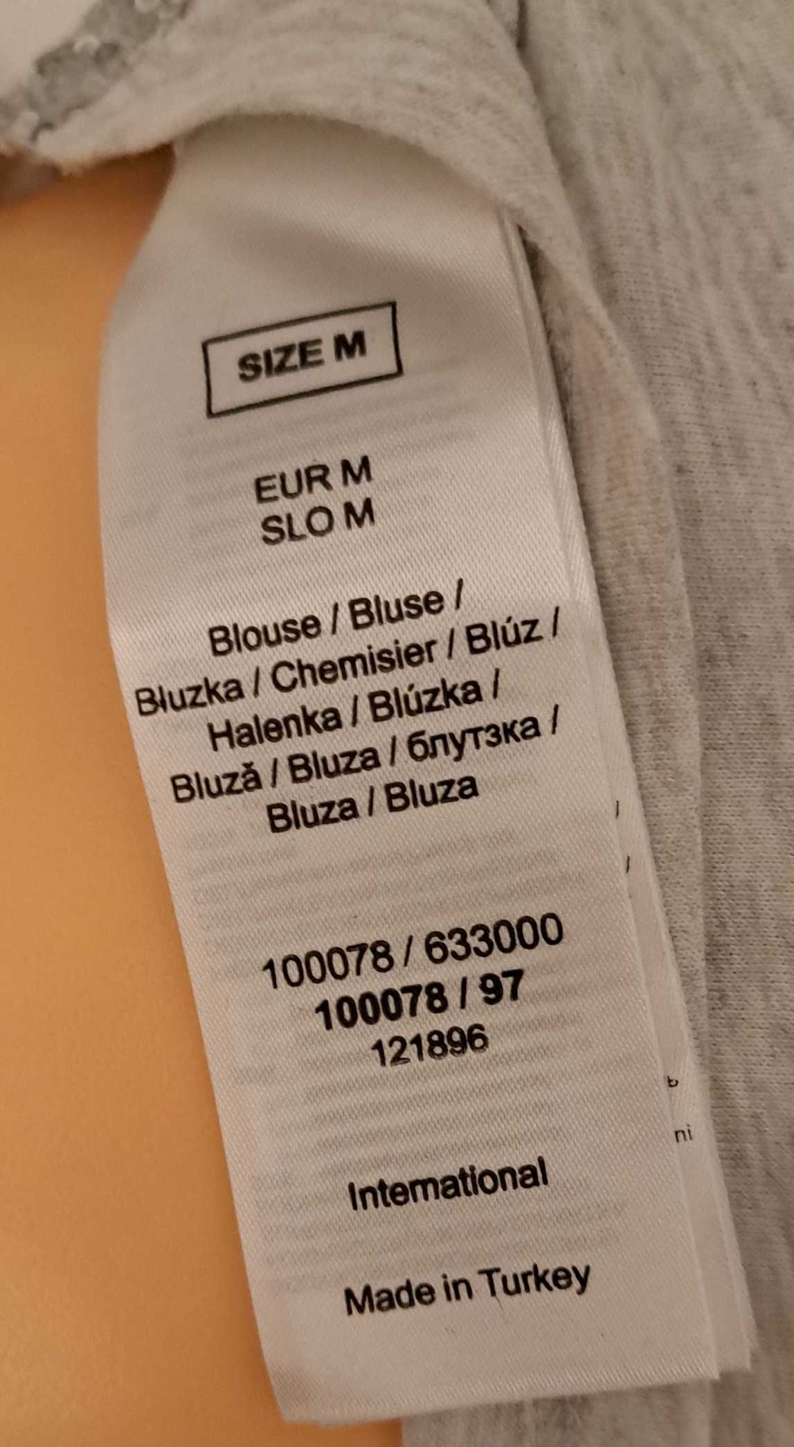 Bluzka firmy ORSAY wyszywana cekinami rozmiar M, z podszewką Promocja!