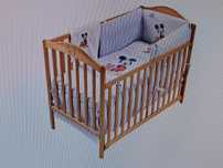 Cama de bebé em madeira
