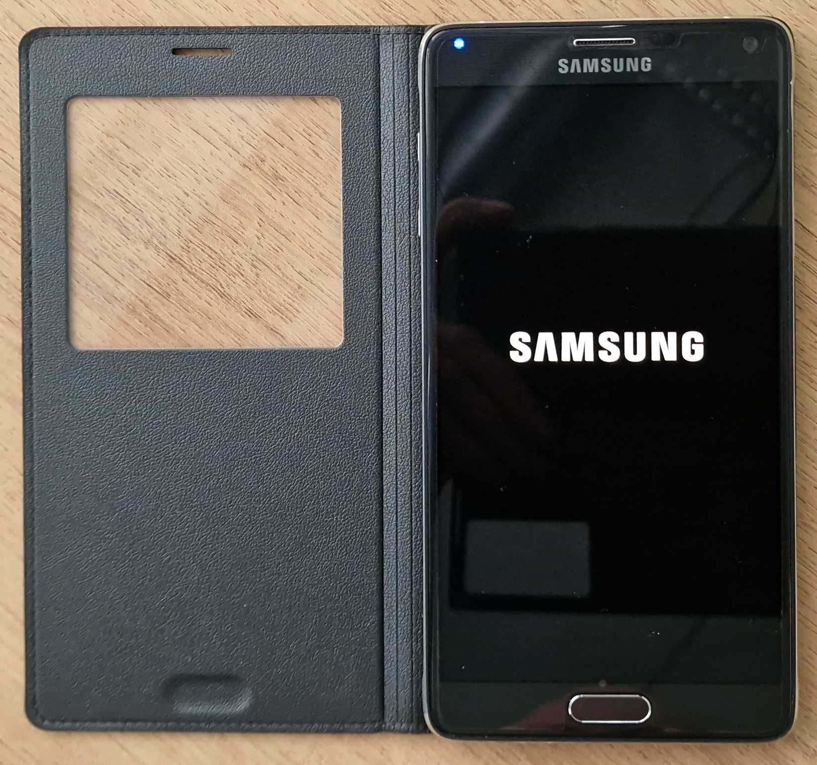 Samsung Galaxy Note 4 + nowe etui + ładowarka i etui na baterię