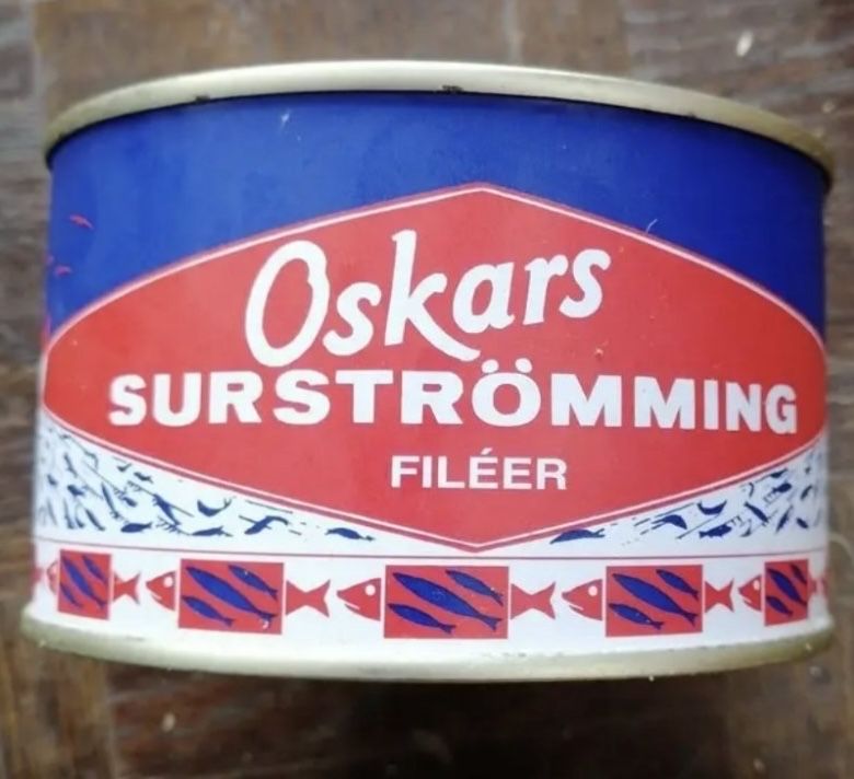 Консерва сюрстрьомінг, surströmming мала та велика банки