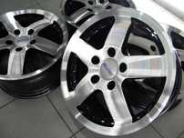 Felgi 15 Volkswagen Passat Seat Audi A4 5x112 ET38 Alutec poler