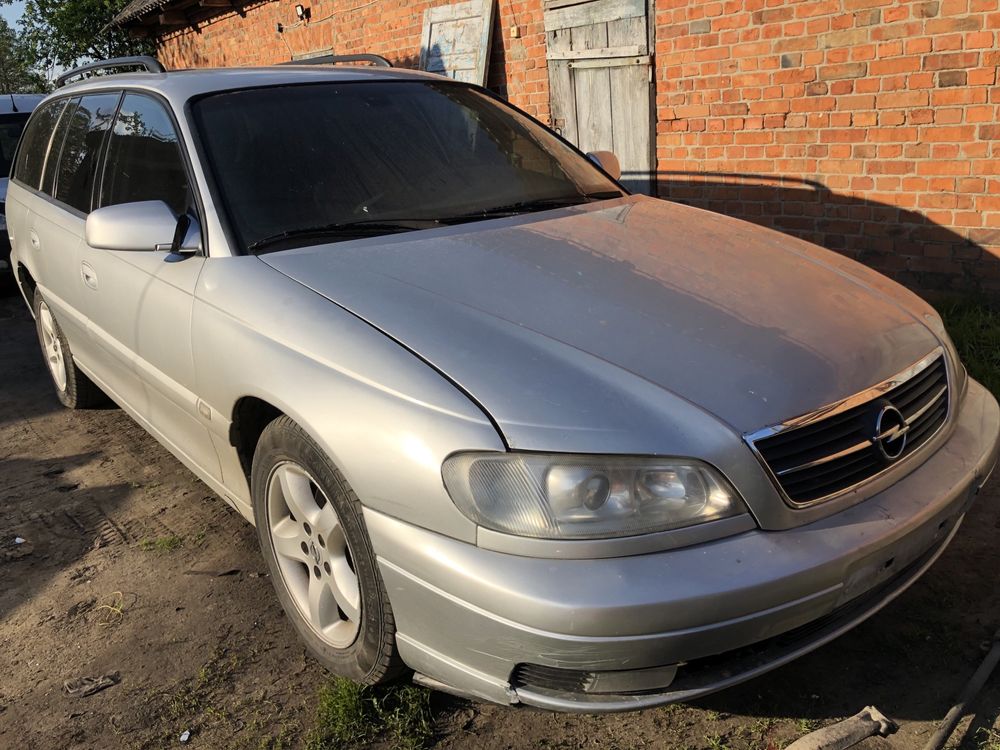 Разборка Opel Omega B бампер капот дверь фары двигатель салон ляда гбц