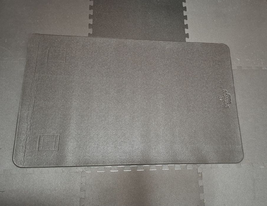 Tapete proteção para bicicleta estática 100 x 70cm marca Domyos