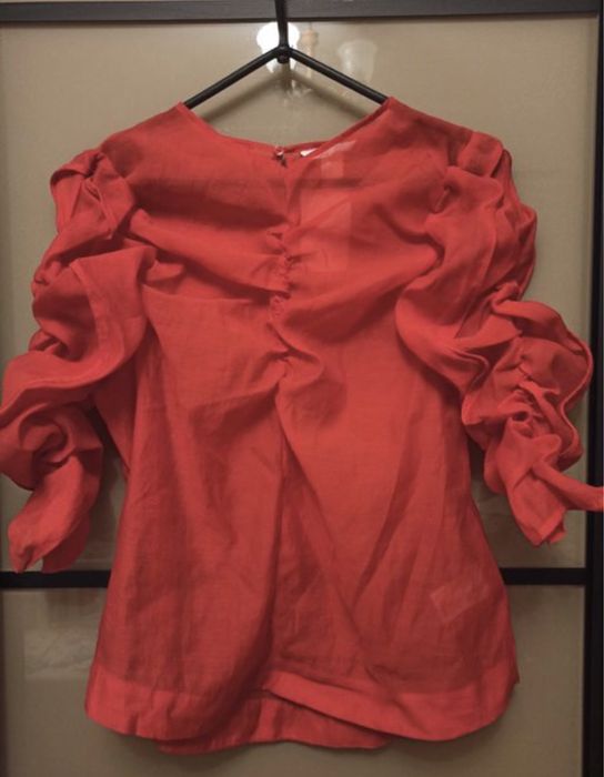 Продам новую , нарядную блузку из органзы H&M