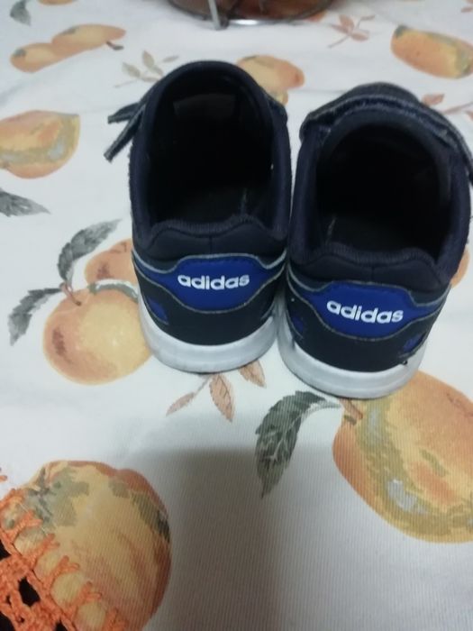 Adidas azuis riscas brancas