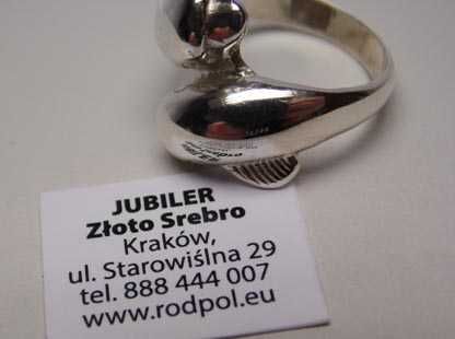 Srebrny pierścionek dwa delfiny  R.14.