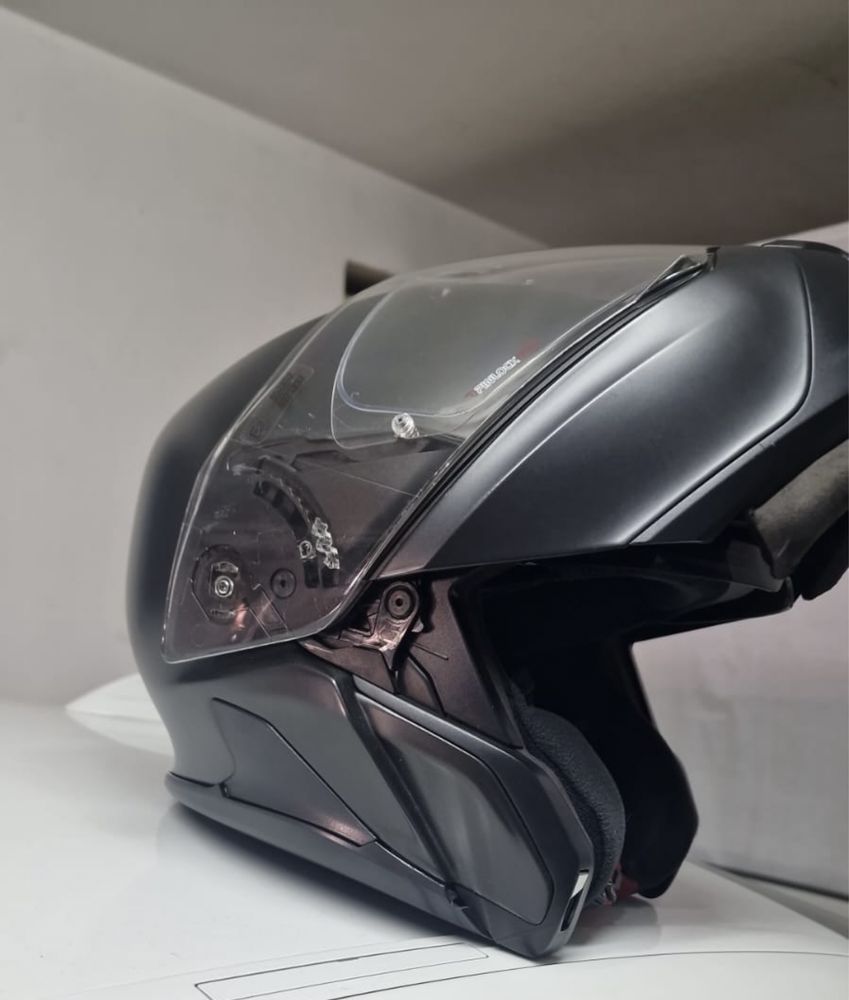 1 capacete com pouco uso . Da marca BMW c/saco