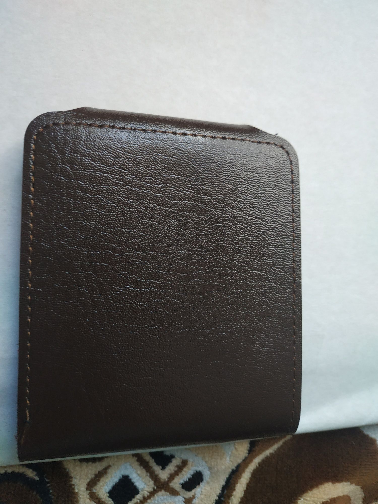 Чоловічий гаманець колір коричневий.Новий.