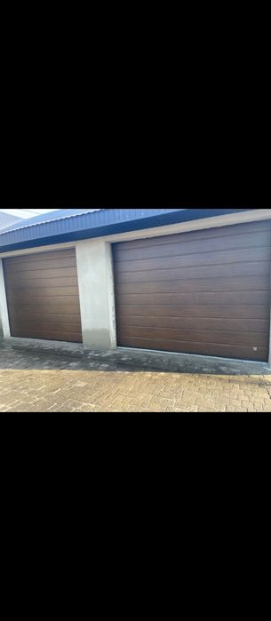 Гаражні секційні ворота відкатні розпашні ворота автоматика Голоби