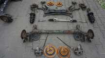 ZACISK TARCZA ZAWIESZENIE TOYOTA YARIS II 1.3 VVTI