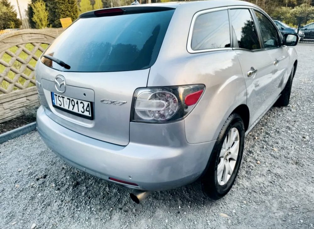 Mazds cx7 передній бампер .