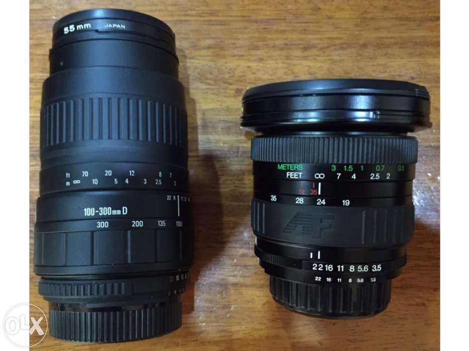 Máquina fotográfica Nikon F60 + 2 lentes + grande angular