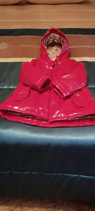 Capa impermeável com capuz de marca orchestra