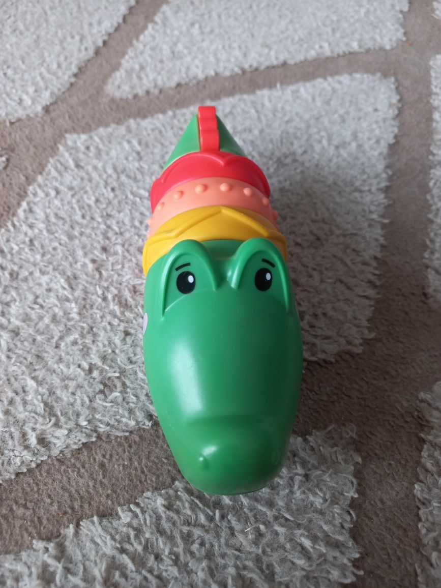 Grzechotki Skip Hop krokodyl klikający Fisher Price zabawki sensoryczn