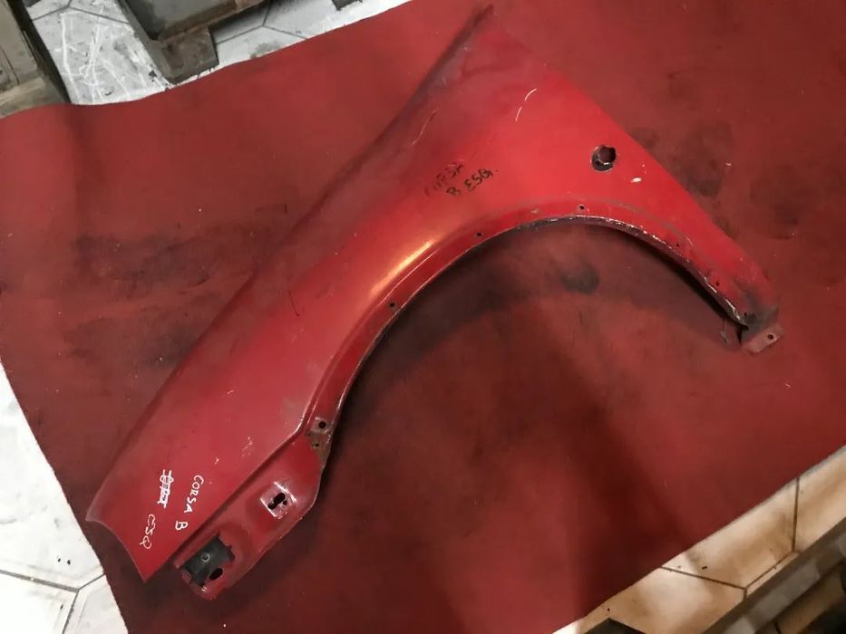 GUARDA-LAMAS OPEL CORSA B ESQUERDO